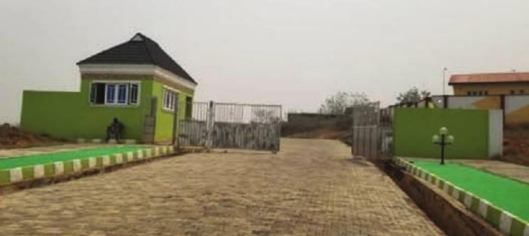 Gatehouse and paved entrance road